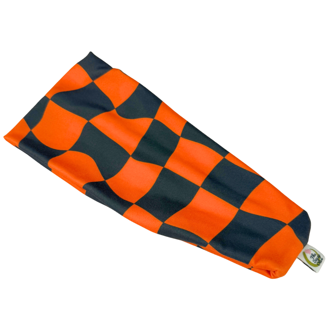 Bandeau extensible à carreaux orange et noir